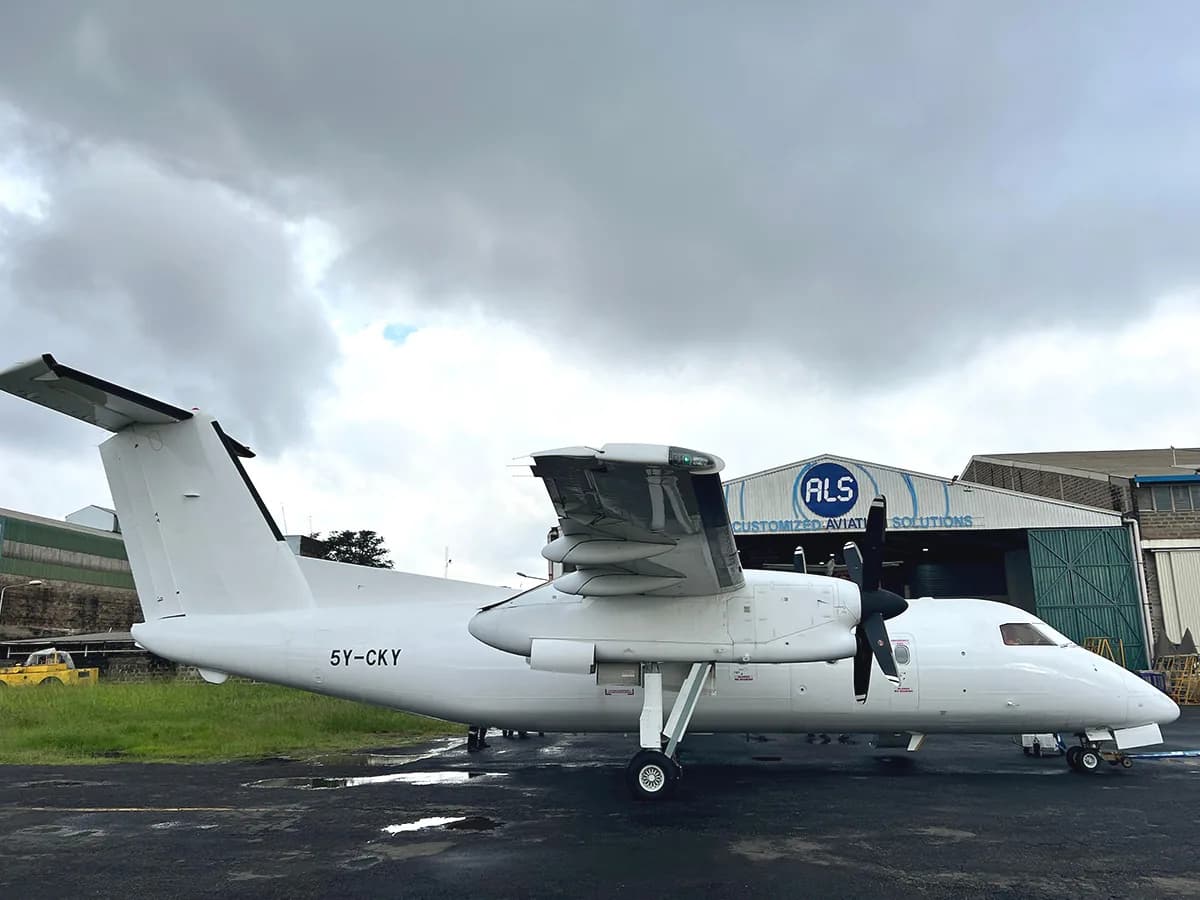 ALS Dash 8-200 5Y-CKY in front of the ALS hangar at Wilson Airport